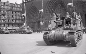 The Campaign in North-west Europe 1944-45 Priest 105mm self-propelled guns of the French 2nd Armoured Division in front of Notre Dame in Paris, 26 August 1944.