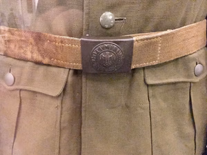 Uniform einer Propagandakompanie des Afrikakorps . WW2 uniform of Nazi Germany 's Wehrmacht : tunic etc. of a propaganda company of the Africa Corps ca. 1941. Web belt with Wehrmacht belt buckle. Inscription: Gott mit uns . Smartphone photo taken on 13 October 2019 at Deutsches Historisches Museum , Berlin, Germany.