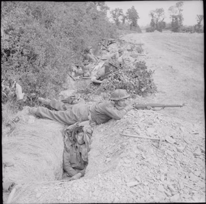 The British Army in the Normandy Campaign 1944 Infantry occupy slit trenches in the forward area between Hill 112 and Hill 113 in the Odon valley, 16 July 1944.