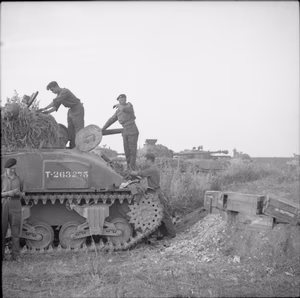 The British Army in Normandy 1944 Sherman tank crews preparing for Operation 'Totalise', 7 August 1944.