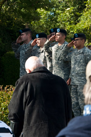 "In a few hours I'm going to take the best company of men in the world into France. We'll give the bastards hell. Strangely, I'm not particularly scared. But in my heart is a terrific longing to hold you in my arms. I love you Sweetheart - forever. Your Tom," an excerpt from a letter that was written by 1st Lt. Thomas Meehan III, company commander of E Company, 506th Parachute Infantry Regiment, 101st Air Assault. The hands of a wristwatch forever stopped at 1:12 on the morning of June 5, 1944, were lost to the fields outside of Beuzeville Au Plain, 56 years later they were recovered. A year later, in 2001, a monument was unveiled to memorialize the crew and paratroopers; closing a chapter of an unfinished story for the family, friends, loved ones and comrades of the men who lost their lives during Operation Overload. The C-47 carrying Meehan was hit with anti-aircraft fire, and caught fire near the rear of the plane. As the fire traveled forward to the cockpit, the paratroopers aboard were unable to jump because the plane's altitude was too low for the parachutes to open. All were lost in the crash. Today, June 3, 2015, Soldiers of the 101st Airborne Division (Air Assault) attend a ceremony to remember those men and their actions on that fateful day. Over 380 service members from Europe and affiliated D-Day historical units are participating in the 71st anniversary as part of JTF D-Day 71. The Task Force, based in Saint Mere Eglise, France, is supporting local events across Normandy, June 2-8, 2015, to commemorate the selfless actions by all the allies on D-Day that continue to resonate 71 years later. (U.S. Army photo by Capt. Saska Ball, USACAPOC(A) PAO) Unit: U.S. Army Civil Affairs and Psychological Operations Command (Airborne) DVIDS Tags: Marine; Soldier; 82nd Airborne Division; AFN; USAFE; 82nd; France; NAVEUR; Honor; USACAPOC; 4th Infantry Division; Band of Brothers; Normandy; Rangers; re-enactment; Sacrifice; SOCEUR; Jumpmaster; 101st; Sky Soldiers; 75th Ranger Regiment; U.S. Army Europe; Armed Forces Network; 1st ID; 82nd Airborne; Public Affairs; 25th; WWII; EUCOM; Jump Wings; Community Relations; Combat Camera; World War II; Infantry; U.S. Marines; paratrooper; Airborne; All American; Amphibious assault; 1st Infantry Division; 21st Theater Sustainment Command; U.S. Air Forces in Europe; Omaha Beach; 4th ID; 29th Infantry Division; 173rd; Utah Beach; Screaming Eagles; D-Day; Iron Mike; Greatest Generation; 101st Air Assault; European Command; 982nd COMCAM; Airborne Operation; U.S. Army Soldier; St. Mere Eglise; AFN-E; Operation Overlord; La Cambe; Re-enactors; American Cemetery; C47; Carentan; Cherbourg; Dutch Marines; 29th ID; Special Operations Command Europe; 4/25th; Foreign Wings; Task Force Normandy; 173rd Infantry Brigade; Community Engagement; U.S. Army Civil Affairs & Psychological Operations Command (Airborne); U.S. Army Europe Band; 1-507th PIR; NATO Alliance; Higgins Boat; Normandy American Cemetery and Memorial; Task Force Normandy 71; Joint Task Force D-Day 71; D-Day 71; Point Du Hoc; 101st (AASLT); La Fierre; USEREUR; 6 June 1944; Juno Beach; Foreign Jump; Dutch Sailors; 409th Combat Service Support Brigade; Naval Forces in Europe; 4/25th Infantry Brigade Combat Team (Airborne) 4/25; 1/75 Rangers; 1-507th Parachute Infantry Regiment; Dday71