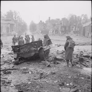 The British Army in the Normandy Campaign 1944 The remains of a universal carrier blown up by a mine in Tilly-sur-Seulles, 19 June 1944.
