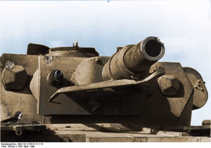 This is a retouched picture , which means that it has been digitally altered from its original version. Modifications: recolored . The original can be viewed here: Bundesarchiv Bild 101I-783-0117-113, Nordafrika, Panzer IV, Turm.jpg : . Modifications made by Ruffneck88 . .mw-parser-output table.commons-file-information-table,.mw-parser-output .fileinfotpl-type-information,.mw-parser-output .fileinfotpl-type-artwork{border:1px solid var(--border-color-base,#a2a9b1);background-color:var(--background-color-interactive-subtle,#f8f9fa);padding:5px;font-size:95%;border-spacing:2px;box-sizing:border-box;margin:0;width:100%;color:inherit}.mw-parser-output table.commons-file-information-table>tbody>tr,.mw-parser-output .fileinfotpl-type-information>tbody>tr,.mw-parser-output .fileinfotpl-type-artwork>tbody>tr{vertical-align:top}.mw-parser-output table.commons-file-information-table>tbody>tr>td,.mw-parser-output table.commons-file-information-table>tbody>tr>th,.mw-parser-output .fileinfotpl-type-information>tbody>tr>td,.mw-parser-output .fileinfotpl-type-information>tbody>tr>th,.mw-parser-output .fileinfotpl-type-artwork>tbody>tr>td,.mw-parser-output .fileinfotpl-type-artwork>tbody>tr>th{padding:4px}.mw-parser-output .fileinfo-paramfield{background:#ccf;text-align:right;padding-right:0.4em;width:15%;font-weight:bold;color:inherit}.mw-parser-output .commons-file-information-table+table.commons-file-information-table,.mw-parser-output .commons-file-information-table+div.commons-file-information-table>table{border-top:0;padding-top:0;margin-top:-8px}@media only screen and (max-width:719px){.mw-parser-output table.commons-file-information-table,.mw-parser-output .commons-file-information-table .fileinfotpl-type-information,.mw-parser-output .commons-file-information-table .fileinfotpl-type-artwork{border-spacing:0;padding:0;word-break:break-word;width:100%!important}.mw-parser-output .commons-file-information-table>tbody,.mw-parser-output .fileinfotpl-type-information>tbody,.mw-parser-output .fileinfotpl-type-artwork>tbody{display:block}.mw-parser-output .commons-file-information-table>tbody>tr>td,.mw-parser-output .commons-file-information-table>tbody>tr>th,.mw-parser-output .fileinfotpl-type-information>tbody>tr>td,.mw-parser-output .fileinfotpl-type-information>tbody>tr>th,.mw-parser-output .fileinfotpl-type-artwork>tbody>tr>td,.mw-parser-output .fileinfotpl-type-artwork>tbody>tr>th{padding:0.2em 0.4em;text-align:left;text-align:start}.mw-parser-output .commons-file-information-table>tbody>tr,.mw-parser-output .fileinfotpl-type-information>tbody>tr,.mw-parser-output .fileinfotpl-type-artwork>tbody>tr{display:flex;flex-direction:column}.mw-parser-output .commons-file-information-table+table.commons-file-information-table,.mw-parser-output .commons-file-information-table+div.commons-file-information-table>table{margin-top:-1px}.mw-parser-output table .fileinfo-paramfield{box-sizing:border-box;flex:1 0 100%;width:100%}}.mw-parser-output table.commons-file-information-table,.mw-parser-output .fileinfotpl-type-information,.mw-parser-output .fileinfotpl-type-artwork,.mw-parser-output .fileinfo-paramfield{color:var(--color-base,#202122)}html.skin-theme-clientpref-night .mw-parser-output .fileinfo-paramfield{background:#2a2a5c;color:white}html.skin-theme-clientpref-night .mw-parser-output .fileinfotpl-type-artwork tbody>tr>th[style*="#ccf"]{background-color:#2a2a5c!important;color:white}@media screen and (prefers-color-scheme:dark){html.skin-theme-clientpref-os .mw-parser-output .fileinfo-paramfield{background:#2a2a5c;color:white}html.skin-theme-clientpref-os .mw-parser-output .fileinfotpl-type-artwork tbody>tr>th[style*="#ccf"]{background-color:#2a2a5c!important;color:white}} Nordafrika, Panzer IV, Turm ( ) Photographer Dörner Archive description InfoField Description provided by the archive when the original description is incomplete or wrong. You can help by reporting errors and typos at Commons:Bundesarchiv/Error reports . Nordafrika.- Panzer IV mit Treffer am Geschütz (7,5 cm KwK/L24) bzw. am Turm, Detailaufnahme; PK Afrika Title Nordafrika, Panzer IV, Turm Depicted place North Africa Date April 1941 date QS:P571,+1941-04-00T00:00:00Z/10 Collection German Federal Archives Native name Das Bundesarchiv Parent institution Federal Government Commissioner for Culture and Media Location Koblenz (headquarters) Coordinates 50° 20′ 32.71″ N, 7° 34′ 21.22″ E Established 1946 Website www.bundesarchiv.de Authority file : Q685753 VIAF : 137346469 ISNI : 0000000405552728 LCCN : n92025526 NLA : 36455393 OSM : 1844909 WorldCat institution QS:P195,Q685753 Current location Propagandakompanien der Wehrmacht - Heer und Luftwaffe (Bild 101 I) Accession number Bild 101I-783-0117-113 Source This image was provided to Wikimedia Commons by the German Federal Archive (Deutsches Bundesarchiv) as part of a cooperation project . The German Federal Archive guarantees an authentic representation only using the originals (negative and/or positive), resp. the digitalization of the originals as provided by the Digital Image Archive .