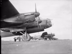 IWM caption : Avro Lancasters of No. 514 Squadron RAF , lined up at Waterbeach , Cambridgeshire, before taking part in a daylight attack on fortified villages east of Caen, in support of the Second Army's armoured offensive in the Normandy battle area ( Operation GOODWOOD ).