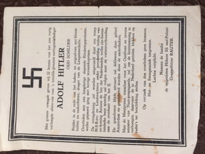 The leaflet can be roughly translated as follows: It is with great joy that we inform you of the so ardently desired of the world's greatest war criminal Adolf Hitler old painter Knight in the order of the crochet eye cross with flower bulbs and sugar beets, bearer of the Lie Medal. Died of a long drawn-out Blitzkrieg epidemic, which was accompanied by severe invasion fevers. The song of joy will be performed by a group of N.S.B.ers and Landwachters under the personal leadership of ex-king Antton de Iste of the Netherlands who will soon follow his foreign boss to the rubbish incineration on the other side of the IJ. The grandiose happy funeral will march through all of Amsterdam and be watched by the people in hiding. Max de Mooiprater, recruiter for the Eastern Front and also minister of Nazi propaganda, will make the clocks and radios available, stolen in the Netherlands, to raise the festive mood. No bombs on the side of the deceased. Hot and swing music allowed. Laughter is mandatory. On behalf of the family the imprisoned Hohere SS und Polizei Gruppefuhrer RAUTER.