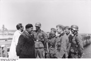 For documentary purposes the German Federal Archive often retained the original image captions , which may be erroneous, biased, obsolete or politically extreme . SS-Totenkopf-Division Küstenschutz 1.6.-7(?)6.1940; S-Art.Abt./SS-T.Div