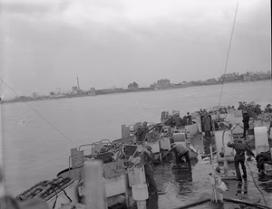 D-day - Allied Forces during the Invasion of Normandy 6 June 1944 Gun crews aboard an LCF (Landing Craft Flak) off the Normandy coast, 6 June 1944. Courseulles-sur-Mer, Juno area.