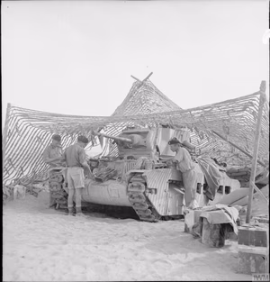 The British Army in North Africa 1941 A Matilda tank under camouflage netting in Tobruk, 18 November 1941.