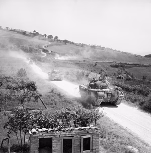 IWM caption : Churchill tanks of 51st Royal Tank Regiment move forward near Isola Del Piano in support of 138th Brigade during the advance on the Gothic Line , Italy.