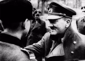 This image is here listed as a non-free image. https://en.wikipedia.org/wiki/File:Hitler_20_April_1945.jpg However, the website that is given as source says "This anonymous work originating in the European Union is in the public domain. Its copyright expired 70 years after the work was made available to the public".