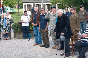 "In a few hours I'm going to take the best company of men in the world into France. We'll give the bastards hell. Strangely, I'm not particularly scared. But in my heart is a terrific longing to hold you in my arms. I love you Sweetheart - forever. Your Tom," an excerpt from a letter that was written by 1st Lt. Thomas Meehan III, company commander of E Company, 506th Parachute Infantry Regiment, 101st Air Assault. The hands of a wristwatch forever stopped at 1:12 on the morning of June 5, 1944 were lost to the fields outside of Beuzeville Au Plain, 56 years later they were recovered. A year later, in 2001, a monument was unveiled to memorialize the crew and paratroopers; closing a chapter of an unfinished story for the family, friends, loved ones and comrades of the men who lost their lives during Operation Overload. The C-47 carrying Meehan was hit with anti-aircraft fire, and caught fire near the rear of the plane. As the fire traveled forward to the cockpit, the paratroopers aboard were unable to jump because the plane's altitude was too low for the parachutes to open. All were lost in the crash. Today, June 3, 2015, Soldiers of the 101st Airborne Division (Air Assault) attend a ceremony to remember those men and their actions on that fateful day. Over 380 service members from Europe and affiliated D-Day historical units are participating in the 71st anniversary as part of JTF D-Day 71. The Task Force, based in Saint Mere Eglise, France, is supporting local events across Normandy, June 2-8, 2015, to commemorate the selfless actions by all the allies on D-Day that continue to resonate 71 years later. (U.S. Army photo by Capt. Saska Ball, USACAPOC(A) PAO) Unit: U.S. Army Civil Affairs and Psychological Operations Command (Airborne) DVIDS Tags: Marine; Soldier; 82nd Airborne Division; AFN; USAFE; 82nd; France; NAVEUR; Honor; USACAPOC; 4th Infantry Division; Band of Brothers; Normandy; Rangers; re-enactment; Sacrifice; SOCEUR; Jumpmaster; 101st; Sky Soldiers; 75th Ranger Regiment; U.S. Army Europe; Armed Forces Network; 1st ID; 82nd Airborne; Public Affairs; 25th; WWII; EUCOM; Jump Wings; Community Relations; Combat Camera; World War II; Infantry; U.S. Marines; paratrooper; Airborne; All American; Amphibious assault; 1st Infantry Division; 21st Theater Sustainment Command; U.S. Air Forces in Europe; Omaha Beach; 4th ID; 29th Infantry Division; 173rd; Utah Beach; Screaming Eagles; D-Day; Iron Mike; Greatest Generation; 101st Air Assault; European Command; 982nd COMCAM; Airborne Operation; U.S. Army Soldier; St. Mere Eglise; AFN-E; Operation Overlord; La Cambe; Re-enactors; American Cemetery; C47; Carentan; Cherbourg; Dutch Marines; 29th ID; Special Operations Command Europe; 4/25th; Foreign Wings; Task Force Normandy; 173rd Infantry Brigade; Community Engagement; U.S. Army Civil Affairs & Psychological Operations Command (Airborne); U.S. Army Europe Band; 1-507th PIR; NATO Alliance; Higgins Boat; Normandy American Cemetery and Memorial; Task Force Normandy 71; Joint Task Force D-Day 71; D-Day 71; Point Du Hoc; 101st (AASLT); La Fierre; USEREUR; 6 June 1944; Juno Beach; Foreign Jump; Dutch Sailors; 409th Combat Service Support Brigade; Naval Forces in Europe; 4/25th Infantry Brigade Combat Team (Airborne) 4/25; 1/75 Rangers; 1-507th Parachute Infantry Regiment; dday71