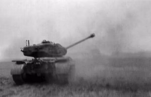 An M26 Pershing fires at German positions across the Rhine on March 7, 1945.