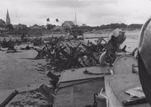 A caption written by Bare reads: "After landing-"Juno" Sector (British Force "J"), lifting 3rd Canadian Infantry Division. Courselles Sur Mer." From the Robert O. Bare Collection (COLL/150) at the Marine Corps Archives and Special Collections OFFICIAL USMC PHOTOGRAPH