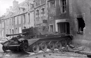 Information added by Wikimedia users. roughly translates as "France, Villers-Bocage.- destroyed British Cruiser Tank VIII Cromwell (Turret number: T 187749) in the village in front of burnt house; PK Signal-Einsatz"