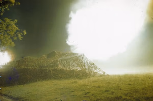 The British Army on the Caen Front in Normandy, July 1944 A camouflaged 155mm gun of 53 Heavy Regiment, Royal Artillery firing during the barrage. The 155mm was an American gun often manned by British troops on the Normandy front.