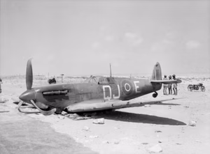 A Supermarine Spitfire Mk.Vb from No. 92 Squadron (QJ-E), Royal Air Force, which made a forced landing near El Alamein, just off the main Alexandria-Mersa Matruh road.