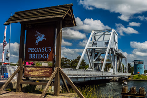 Sipping a coffee at Café Gondrée, looking at Pegasus Bridge