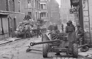 British Sherman tanks and a 6-pdr anti-tank gun in the centre of Caen, Normandy, 10 July 1944. Sherman tanks and 6-pdr anti-tank gun in the centre of Caen, 10 July 1944.