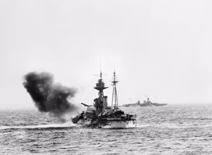 D-day - British Forces during the Invasion of Normandy 6 June 1944 The monitor HMS ROBERTS, part of Bombarding Force 'D' off Le Havre, shelling German gun batteries in support of the landings on Sword area, 6 June 1944. The photo was taken from the frigate HMS HOLMES which formed part of the escort group.