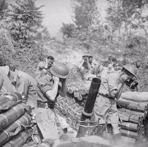 A 4.2-inch mortar of 'S' Troop, 307th Battery, 99th Light Anti-Aircraft Regiment, in action with the mortar for the first time, at Cassino , Italy.