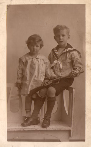 Francis Hugh Vowles (born Rugby 18 September 1911 died Gloucester 2 May 1990) attended Cheltenham College, obtained a Bachelor of Laws degree from the University of London External System in 1937, and trained as a lawyer under his uncle Henry Hayes Vowles (junior) of H.H.Vowles and Company, Gloucester. In 1943, Francis Vowles trained to become a Pilot Officer with the RAF at the 13th Initial Training Wing (C Flight, No. 3 Squadron) which was possibly based at the Toorak Hotel, Torquay. From 17–31 September 1943, he was at the 4 EFTS Brough, Yorkshire. Between 31 September 1943 and 27 November 1943, he travelled to Canada. There he was taught trainee pilots to fly the de Havilland Tiger Moth. He was based at the 35 EFTS at Neepawa from 27 September 1943 to 11 March 1944. From 11 March 1944 to 20 October 1944, he was based at the 17 Service Flying Training School, Souris, Manitoba. In Souris, he flew Anson II planes. From 9 April 1945 to 8 August 1945, he was based at the No 1333 Transport Support Conversion Unit, Leicester East. Here he flew Oxford and Dakota planes and undertook "radar flights". Stonehouse church sunday school certificate of merit awarded to Eleanor Biss instead of a prize, the value of which she has presented to the Belgian refugees 1914. Eleanor Biss was the second wife of Hugh Pembroke Vowles. Francis Vowles went on to become a partner in Vowles, Jessop and Keen of Lorraine House, 45 Park Road, Gloucester, the house in which his Pearce grandparents had lived. He was Clerk to County Justices (Gloucester division). FH Vowles married Elizabeth Langhorne BA (1911–1999) and was a member of the Royal Air Force Association (Gloucester branch). As well as a full-time solicitor, he was also honorary legal adviser to the Gloucester Association of parish and town councils from 1936 to 1976. He and his wife lived at the Old Rectory, Whaddon, Gloucester. Before his death, they built and moved into a new, adjacent house ("New Hasbrook") which retained the original pond. Christopher David Vowles (born Gloucester March 1916) completed articles in Gloucester. He visited the Soviet Union in 1936 and as result joined the Communist Party of Great Britain, remaining a member until its dissolution. He qualified as a solicitor in 1940 but during the second world war worked as a mechanical engineer for Dowty-Rotol, Gloucester, on aircraft production and becoming the works union convenor. After the war, he became sub-editor the Daily Worker. In 1947, be went into private practice with the legal firm Garber Vowles and company, London, later known as Gaster, Vowles, Turner and Loeffler. The firm was retained by a number of trade unions and advised the governments of Czechoslovakia and Poland. His obituary was published in the Morning Star on 28 September 1993. He was a director of Priday, Metford and Company Limited and owned a cottage in Southcot, Pewsey, Wiltshire.