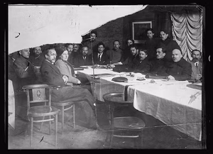 Study these faces. It is the only known photograph of the Chief Commissaries of Kharkov, found in its half-destroyed condition, in Syenko's office after his flight. It will be evidence when some of these men are brought to trial. Study the faces. This is the type of man who has looted Russia, under the guise of a political liberation — American Red Cross. Russia--Kharkov. Glass negatives. — 8 October 1919 [date received]