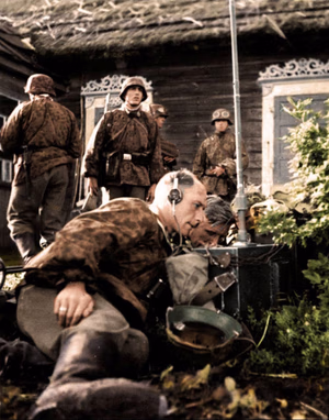 This is a retouched picture , which means that it has been digitally altered from its original version. Modifications: recolored . The original can be viewed here: Bundesarchiv Bild 101III-Wiegand-114-03, Russland, Funker auf Gefechtsstand.jpg : . Modifications made by Ruffneck'88 . .mw-parser-output table.commons-file-information-table,.mw-parser-output .fileinfotpl-type-information,.mw-parser-output .fileinfotpl-type-artwork{border:1px solid var(--border-color-base,#a2a9b1);background-color:var(--background-color-interactive-subtle,#f8f9fa);padding:5px;font-size:95%;border-spacing:2px;box-sizing:border-box;margin:0;width:100%;color:inherit}.mw-parser-output table.commons-file-information-table>tbody>tr,.mw-parser-output .fileinfotpl-type-information>tbody>tr,.mw-parser-output .fileinfotpl-type-artwork>tbody>tr{vertical-align:top}.mw-parser-output table.commons-file-information-table>tbody>tr>td,.mw-parser-output table.commons-file-information-table>tbody>tr>th,.mw-parser-output .fileinfotpl-type-information>tbody>tr>td,.mw-parser-output .fileinfotpl-type-information>tbody>tr>th,.mw-parser-output .fileinfotpl-type-artwork>tbody>tr>td,.mw-parser-output .fileinfotpl-type-artwork>tbody>tr>th{padding:4px}.mw-parser-output .fileinfo-paramfield{background:#ccf;text-align:right;padding-right:0.4em;width:15%;font-weight:bold;color:inherit}.mw-parser-output .commons-file-information-table+table.commons-file-information-table,.mw-parser-output .commons-file-information-table+div.commons-file-information-table>table{border-top:0;padding-top:0;margin-top:-8px}@media only screen and (max-width:719px){.mw-parser-output table.commons-file-information-table,.mw-parser-output .commons-file-information-table .fileinfotpl-type-information,.mw-parser-output .commons-file-information-table .fileinfotpl-type-artwork{border-spacing:0;padding:0;word-break:break-word;width:100%!important}.mw-parser-output .commons-file-information-table>tbody,.mw-parser-output .fileinfotpl-type-information>tbody,.mw-parser-output .fileinfotpl-type-artwork>tbody{display:block}.mw-parser-output .commons-file-information-table>tbody>tr>td,.mw-parser-output .commons-file-information-table>tbody>tr>th,.mw-parser-output .fileinfotpl-type-information>tbody>tr>td,.mw-parser-output .fileinfotpl-type-information>tbody>tr>th,.mw-parser-output .fileinfotpl-type-artwork>tbody>tr>td,.mw-parser-output .fileinfotpl-type-artwork>tbody>tr>th{padding:0.2em 0.4em;text-align:left;text-align:start}.mw-parser-output .commons-file-information-table>tbody>tr,.mw-parser-output .fileinfotpl-type-information>tbody>tr,.mw-parser-output .fileinfotpl-type-artwork>tbody>tr{display:flex;flex-direction:column}.mw-parser-output .commons-file-information-table+table.commons-file-information-table,.mw-parser-output .commons-file-information-table+div.commons-file-information-table>table{margin-top:-1px}.mw-parser-output table .fileinfo-paramfield{box-sizing:border-box;flex:1 0 100%;width:100%}}.mw-parser-output table.commons-file-information-table,.mw-parser-output .fileinfotpl-type-information,.mw-parser-output .fileinfotpl-type-artwork,.mw-parser-output .fileinfo-paramfield{color:var(--color-base,#202122)}html.skin-theme-clientpref-night .mw-parser-output .fileinfo-paramfield{background:#2a2a5c;color:white}html.skin-theme-clientpref-night .mw-parser-output .fileinfotpl-type-artwork tbody>tr>th[style*="#ccf"]{background-color:#2a2a5c!important;color:white}@media screen and (prefers-color-scheme:dark){html.skin-theme-clientpref-os .mw-parser-output .fileinfo-paramfield{background:#2a2a5c;color:white}html.skin-theme-clientpref-os .mw-parser-output .fileinfotpl-type-artwork tbody>tr>th[style*="#ccf"]{background-color:#2a2a5c!important;color:white}} Russland, Funker auf Gefechtsstand ( ) Photographer Wiegand Archive description InfoField Description provided by the archive when the original description is incomplete or wrong. You can help by reporting errors and typos at Commons:Bundesarchiv/Error reports . Sowjetunion-Nord.- Funker der Waffen-SS-Totenkopf-Division auf einem Gefechtsstand Title Russland, Funker auf Gefechtsstand Depicted place Russia Date 1941 date QS:P571,+1941-00-00T00:00:00Z/9 Collection German Federal Archives Native name Das Bundesarchiv Parent institution Federal Government Commissioner for Culture and Media Location Koblenz (headquarters) Coordinates 50° 20′ 32.71″ N, 7° 34′ 21.22″ E Established 1946 Website www.bundesarchiv.de Authority file : Q685753 VIAF : 137346469 ISNI : 0000000405552728 LCCN : n92025526 NLA : 36455393 OSM : 1844909 WorldCat institution QS:P195,Q685753 Current location Propagandakompanien der Wehrmacht - Waffen-SS (Bild 101 III) Accession number Bild 101III-Wiegand-114-03 Source This image was provided to Wikimedia Commons by the German Federal Archive (Deutsches Bundesarchiv) as part of a cooperation project . The German Federal Archive guarantees an authentic representation only using the originals (negative and/or positive), resp. the digitalization of the originals as provided by the Digital Image Archive .